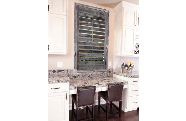 Reclaimed wood shutters on kitchen window in Denver